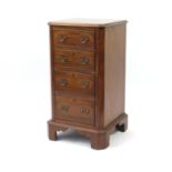 Walnut pedestal four drawer chest with pierced brass handles and bracket feet, 85cm H x 46cm W x