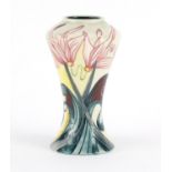 Black Ryden vase hand painted with stylised flowers, impressed marks and painted initials to the