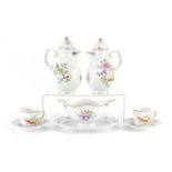 Hollohaza of Hungary hand painted porcelain including two water pots and cups and saucers, the