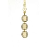 9ct gold cabochon opal and diamond pendant on a 9ct gold necklace, the pendant 4.5cm in length, 6.8g