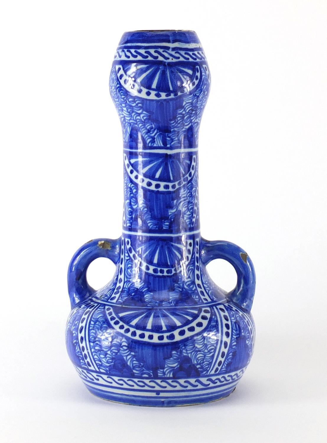 Islamic pottery vase with twin handles, hand painted with stylised flowers, 32cm high :For Further - Image 2 of 3