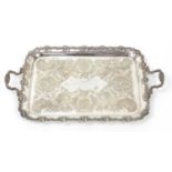 Large rectangular silver plated tray with twin handles and grape vine border, 75cm wide :For Further