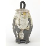 Laurel Keeley studio pottery four footed vase and cover, hand painted and incised with birds,