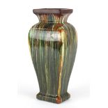 Art Nouveau Bretby pottery vase, having a dripping glaze, in the style of Christopher Dresser,