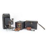Three vintage cameras including a Kodak No 2 Bulls-I Special 99 model and a miniature Vestkam :For