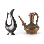 Indian Bidriware ewer with silvered inlay and an Islamic copper water jug, the largest 26cm high :