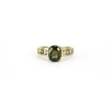9ct gold green stone ring, size U, 4.2g :For Further Condition Reports Please Visit Our Website.