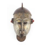 Tribal interest carved wood Bambara warrior mask from Mali, 33cm high :For Further Condition Reports
