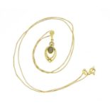 14ct gold tiger's eye and diamond pendant, 2.0g on an 18ct gold necklace, 2.5g :For Further