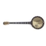 19th century rosewood and ebony four string banjo with mother of pearl keys and inlay, 92cm in