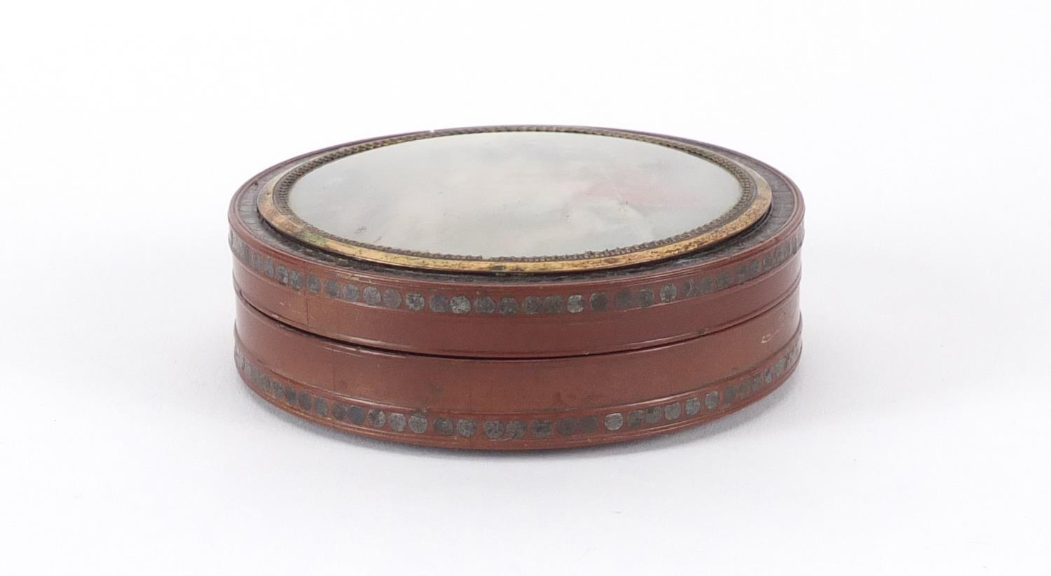 18th century circular lacquer snuff box with gold coloured mounts, metal studwork and - Image 3 of 4