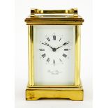 David Peterson brass cased carriage clock striking on a bell, with Roman and Arabic numerals, 11.5cm