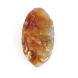 Chinese agate touchstone carved with a water dragon, 9cm wide :For Further Condition Reports