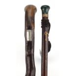 Two walking sticks comprising one with green hardstone pommel and a 19th century Irish example