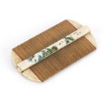 Chinese part stained bone and bamboo comb carved with a landscape and calligraphy, 10.5cm wide :
