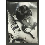 1960's black and white press photograph of Paul McCartney, inscribed Beatles ATB May 1964 to the
