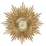 Vintage gilt wood sunburst design wall clock, with silvered dial and Arabic numerals, impressed '26'