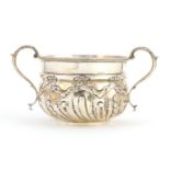 Victorian silver twin handled loving cup with embossed decoration, by W & G Sissons London 1899, 8cm