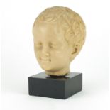 Wax style bust of a young boy, raised on a square black slate base, 22cm high :For Further Condition