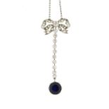 Unmarked white metal sapphire and diamond bow necklace, tests as 18ct gold, the pendant 4.5cm