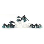 Poole pottery dolphins including white glazed examples, the largest 23cm high :For Further Condition