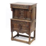 Ipswich oak side cabinet carved with foliate motifs, 121cm H x 72cm W x 44cm D :For Further