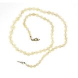 Single string pearl necklace with unmarked white gold diamond clasp, 40cm long, 15.0g :For Further