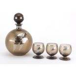 Art Deco globular glass decanter and three glasses with silver overlay, each decorated with geese in