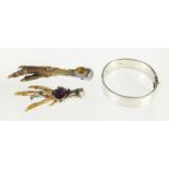 Two Scottish silver animal claw brooches set with citrine and amethyst together with a silver