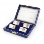 Set of four oval silver napkin rings, GLB London 1981, with fitted case, 4.8cm wide, 132.2g :For