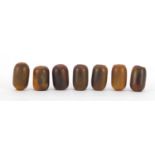 Seven Chinese horn beads, each approximately 2cm wide, 17.0g :For Further Condition Reports Please