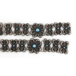 Islamic silver coloured metal flower head design wedding belt inset with turquoise, 80.5cm wide,