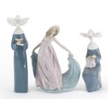 Three Lladro figurines including two nuns, the largest 26.5cm high :For Further Condition Reports