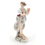19th century hand painted German porcelain figurine of a lady with a mask, blue factory marks to the