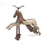 Antique French carved wooden cast iron ride on pedal horse, 72cm in length :For Further Condition