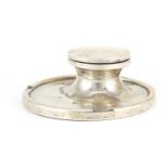 Circular silver capstan inkwell, indistinct makers mark Birmingham 1929, 12.5cm in diameter :For