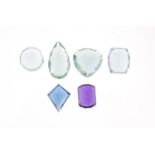 Six gemstones comprising aquamarines 31.70ct, 30.60ct, 28.65ct, 24.60ct, amethyst 22ct and