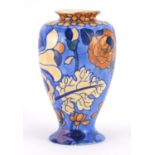 Bursley Ware vase hand painted with stylised flowers by Charlotte Rhead, factory marks to the