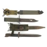 Two American Military interest bayonets with scabbards, one numbered 33709, the largest 34cm in