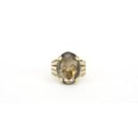 9ct gold smoky quartz ring, size Q, 5.7g :For Further Condition Reports Please Visit Our Website.