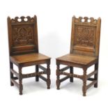 Pair of oak chairs with Art Noveau type carved panels, 102cm high :For Further Condition Reports
