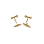 Pair of 9ct gold cufflinks with engraved decoration, 3.6g :For Further Condition Reports Please