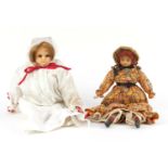 Two wax headed dolls, the largest 40cm in length :For Further Condition Reports Please Visit Our