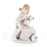 Lladro figurine of a girl with puppies, 20cm high :For Further Condition Reports Please Visit Our