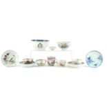 Chinese porcelain including an Armorial bowl, famille rose tea bowls and saucers, the largest 14.5cm