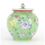 Chinese porcelain lidded vase and cover, finely hand painted in the famille rose palette with
