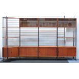 1960's teak Interflex modular corner bookcase, with sliding glass doors above open shelves and