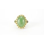 Unmarked gold and cabochon green jade ring, engraved Handarbeit, size P, 5.9g :For Further Condition