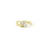 Unmarked gold diamond two stone crossover ring, size L, 2.3g :For Further Condition Reports Please