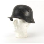 German Military interest tin helmet with leather liner :For Further Condition Reports Please Visit